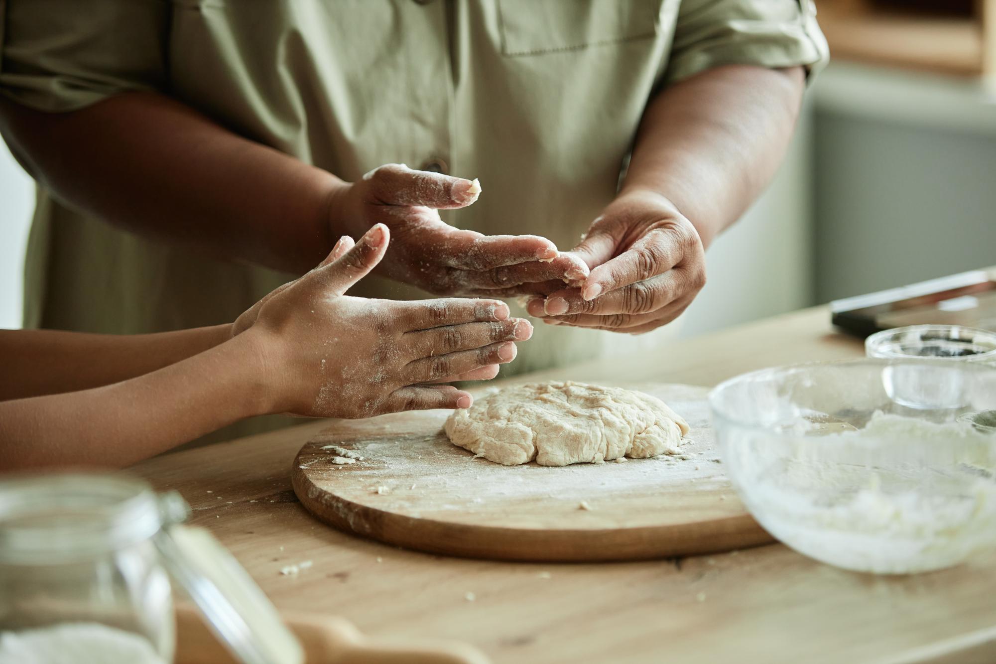 Instructor demonstrating dough technique